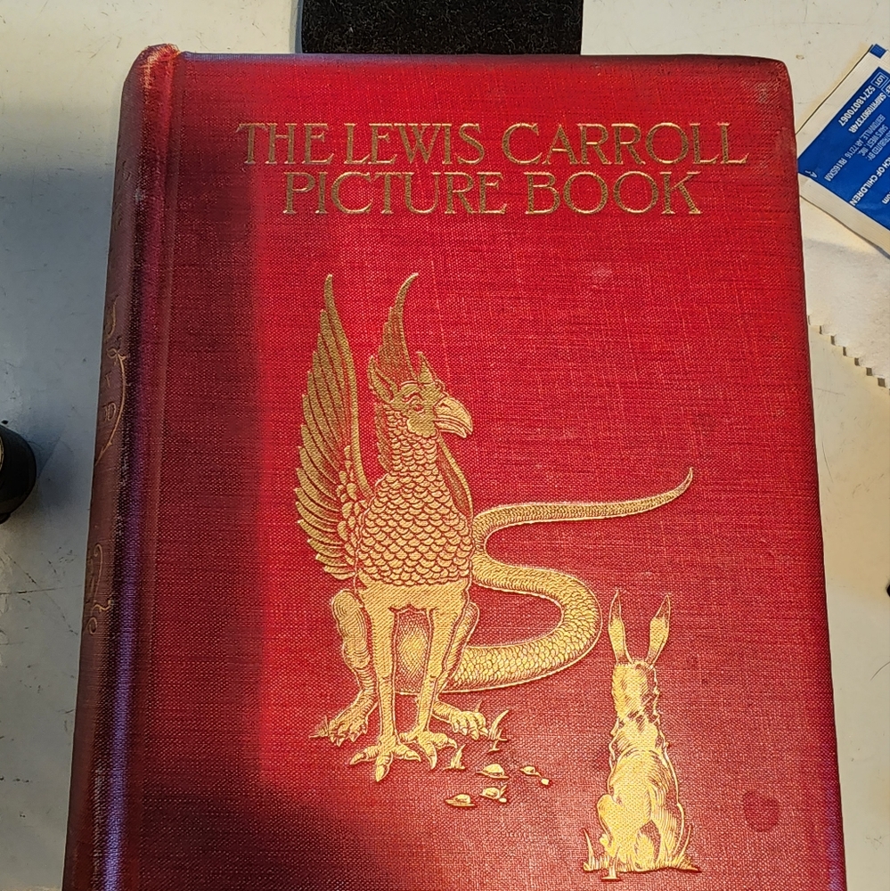 LEWIS CARROLL 1ST EDITION PICTURE BOOK OWNED AND SIGNED BY STAR TREK